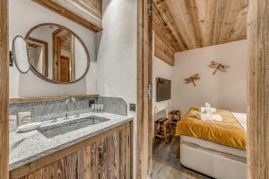 Appart'hotels HOTEL LE VAL D'ISERE : photos des chambres