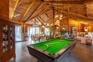Anjees Chalet by StayVista - Mountain-view villa with Classic wooden interiors, Lush lawn & Snooker table