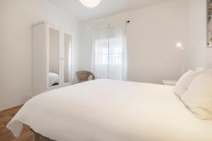 Coral Apartment by Olala Homes