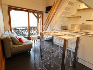 Appartement rénové aux Gets, proche centre et télécabines, 1 chambre + mezzanine, parking inclus - FR-1-623-54