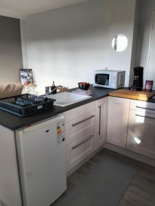 Appartements Charmant logement, vue sur Toulouse 1 min du metro : photos des chambres