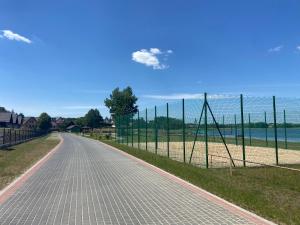 Domki U Zbyszka nad jeziorem z balią ogrodową!