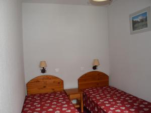 Appartement cosy avec balcon et parking couvert à proximité centre - FR-1-464-165