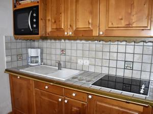 Appartement familial avec balcon sud et parking dans quartier résidentiel - FR-1-464-46