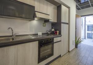 Appartamento con 2 camere e 2 bagni in centro con parcheggio