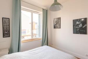 Appartements Appt F4 Neuf Lumineux, centre Ville, Garage : photos des chambres