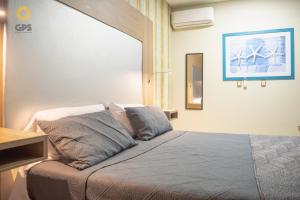 Habitación hotelera 5min de la playa by G P S rentas