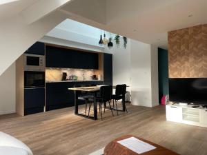 Appartements Sous les toits de l'Yser : photos des chambres