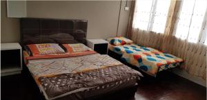 J & I Roomstay B 3 Person with shared bathroom