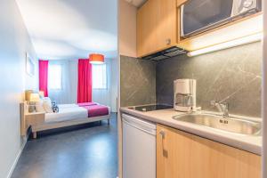 Appart'hotels Appart’City Confort Montpellier Millenaire : Studio Lits Jumeaux