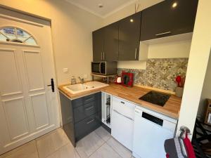 Appartement au calme dans un espace arboré