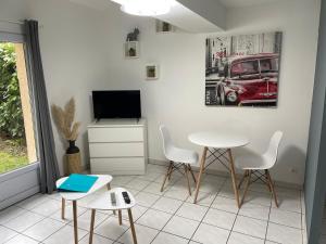 Appartements Le First Auversois charmant studio avec jardinet : photos des chambres