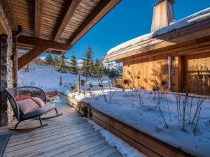 Appartement de luxe avec accès ski aux pieds, spa, terrasses ensoleillées et services hôteliers inclus - FR-1-613-61