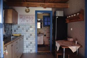 Székelyföld ,Siklódi Kő Vendégház, Tornácosház