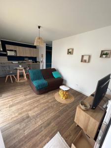 Appartements Charmant logement neuf : photos des chambres