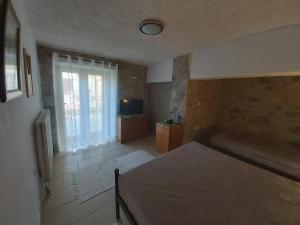 Stymfalia stone house