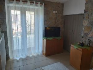 Stymfalia stone house