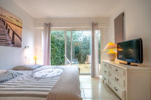 Appartements Pretty air-conditioned house with flower garden : photos des chambres