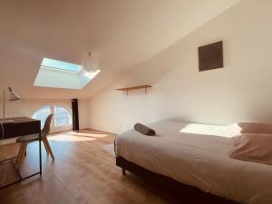 Appartements Bel Appart' 4 chambres duplex Durafour : photos des chambres
