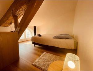 Appartements Bel Appart' 4 chambres duplex Durafour : photos des chambres