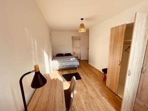 Appartements Bel Appart' 4 chambres duplex Durafour : photos des chambres