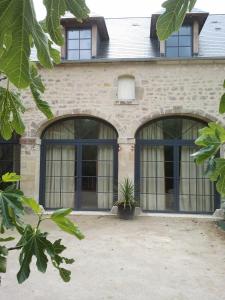 Maisons de vacances Maison de charme dans un beau jardin 