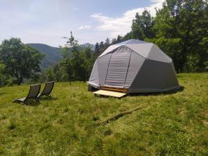 Chalets Petit coin de paradis en pleine nature : photos des chambres