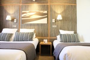 Hotels The Originals Boutique, Hotel Neptune, Montpellier Sud (Inter-Hotel) : Chambre Triple Standard avec vue sur cour