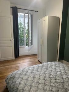 Appartements LE COSY de Saint-Denis : photos des chambres