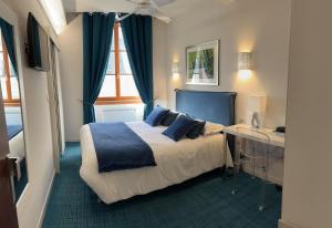 Hotels Logis Hotel des Messageries : photos des chambres