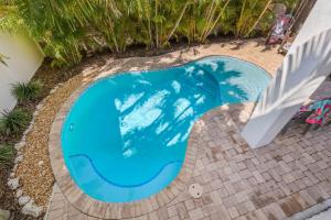Island Hideaway East: 5 Minute Walk to Beach, Private Pool by Anna Maria Life Vacation Rentals