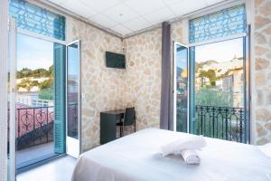 Hotels Hotel De Belgique a Menton : photos des chambres