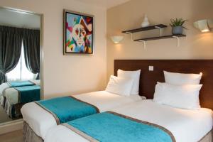 Hotels Queens Boutique Hotel : photos des chambres