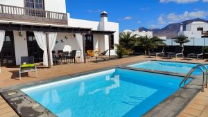 Cosy modern Casa del Sol Naciente with heated pools
