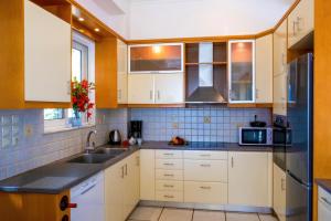 Villa Afroditi in Chania near Airport with Private Pool, Free Wi-Fi, Souda Bay Views, Garden Oasis