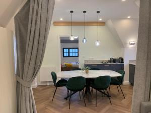 Appartements Le Chaumier : photos des chambres