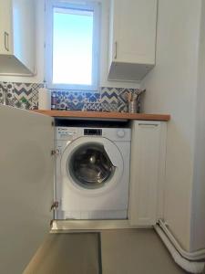 Appartements Appartement proche Paris/Metro : photos des chambres