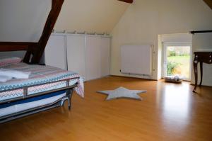 Maisons de vacances L'auberge du lavoir, maison en pierres avec jardin : photos des chambres