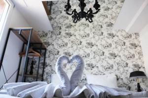 Appartements L'antichambre, neuf avec jardin a 100m de la mer : photos des chambres