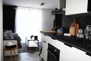 Appartements L'antichambre, neuf avec jardin a 100m de la mer : photos des chambres