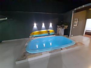 Casa com piscina, confortável e ótima localização