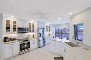 Pet-friendly waterfront home on key lot with view