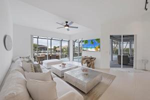Waterfront oasis with pool, kayaks and steps to beach