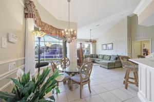 Large waterfront home with all-day sun on pool