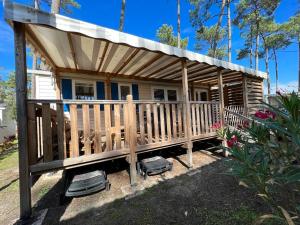 Maisons de vacances Bungalow de 3 chambres avec piscine partagee et jardin amenage a Saint Julien en Born a 5 km de la plage : photos des chambres