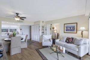Island-style condo with pool, spa and steps to beach