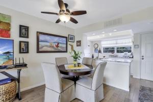 Island-style condo with pool, spa and steps to beach