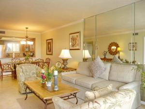 Tranquil waterfront condo with pool and steps to beach