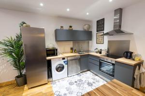Appartements AppartUnique - Chez Helder, la Totale : photos des chambres