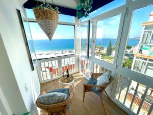 GATU Casa Muse junto a la playa, vista al mar, aire acc, terraza, wifi y chimenea " Preferente mayores de 21 años y familias "